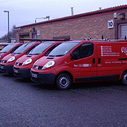 photo of the Electrix Solutions site with 4 of the company vans