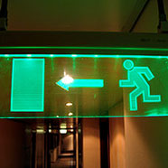 photo of a lit emergency exit sign